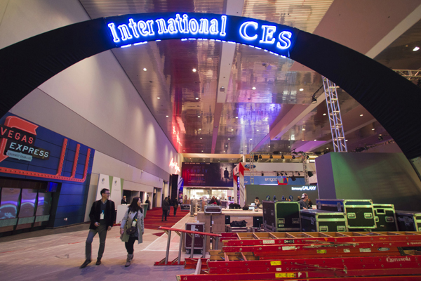 Workers set up booths in preparation for the 2015 International Consumer Electronics Show (CES) in the lobby of Las Vegas Convention Center in Las Vegas